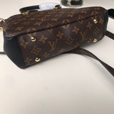 Styled lifestyle shot of everyday-luxe premium women's handbag – women's luxury handbag