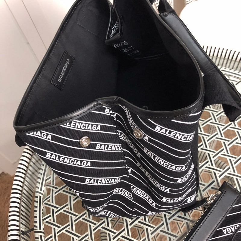 Back view of polished structured women's handbag – women's statement bag