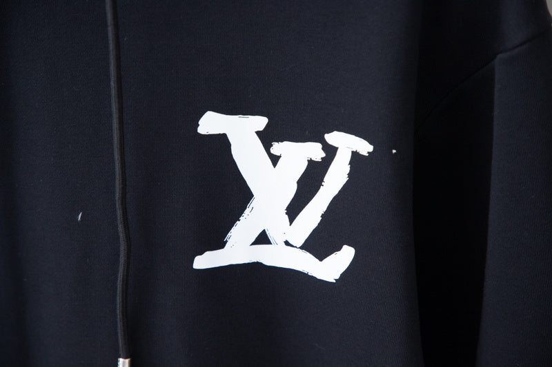 Flat lay presentation of Louis Vuitton luxury clothing with relaxed-fit cut