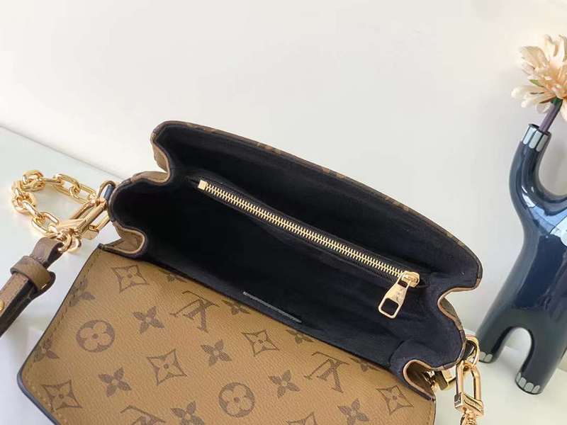 Front view of modern everyday-luxe women's handbag – women's statement bag