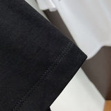 Full styled look of Moncler luxury clothing with relaxed-fit cut