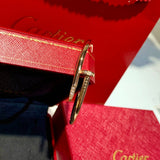Angled view of Cartier unisex jewelry piece