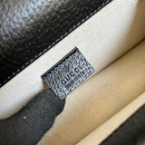 Side profile of signature statement women's handbag – women's designer-style accessory