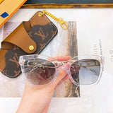 Front view of Louis Vuitton unisex sunglasses