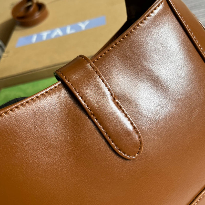Styled lifestyle shot of polished sleek women's handbag – women's designer-style accessory