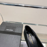 Three-quarter angle view of Saint Laurent luxury piece style No.002