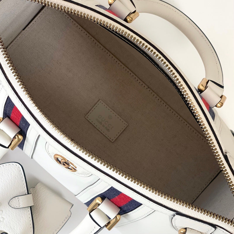 Back view of statement polished women's handbag – women's everyday handbag