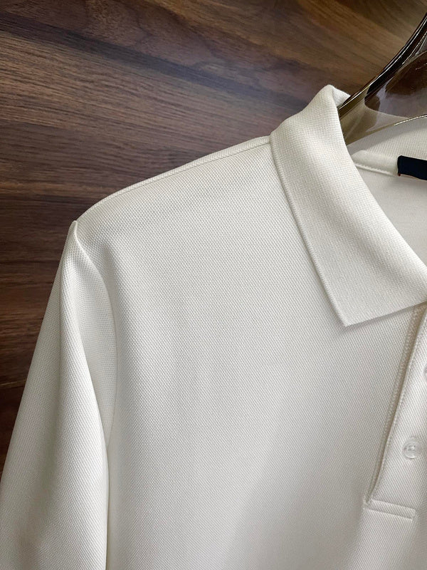 Full styled look of Louis Vuitton luxury clothing with label-forward styling