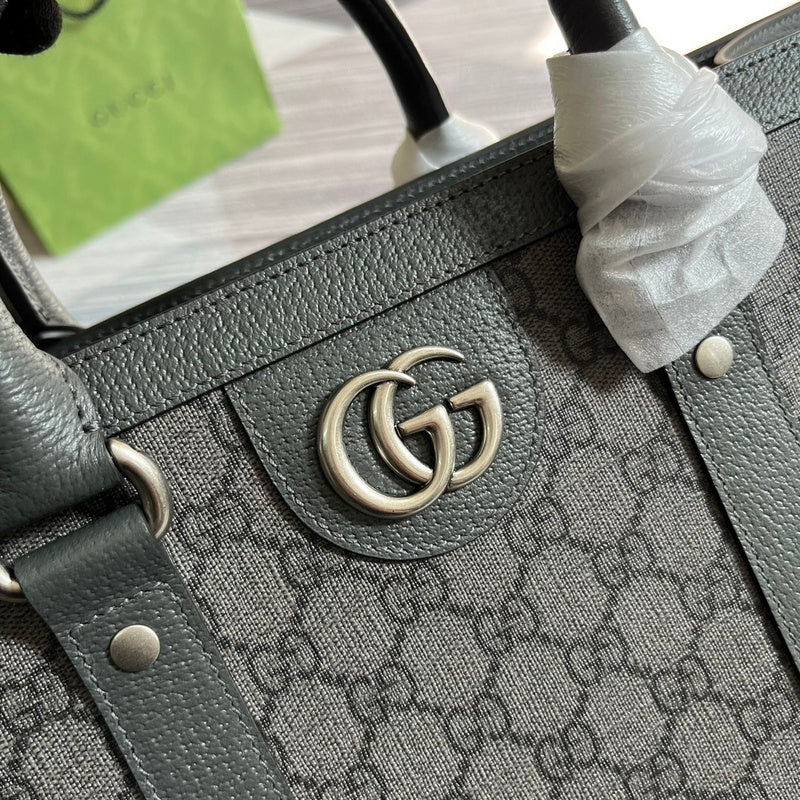 Handle and strap detail of sleek classic women's handbag – women's designer-style accessory