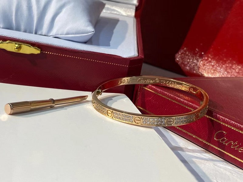 Front view of Cartier unisex jewelry piece