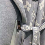 Flat lay presentation of Louis Vuitton luxury clothing with contemporary cut