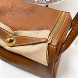 Side view of curated structured handbag