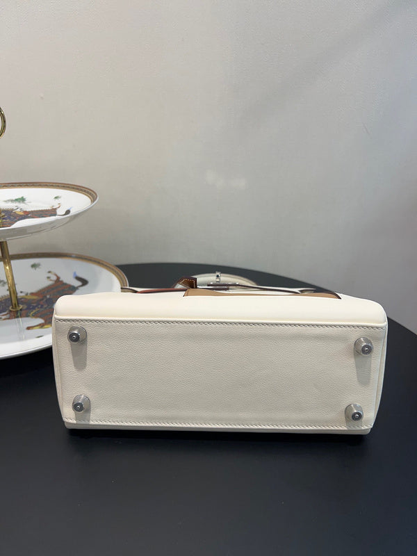 Side view of polished structured handbag