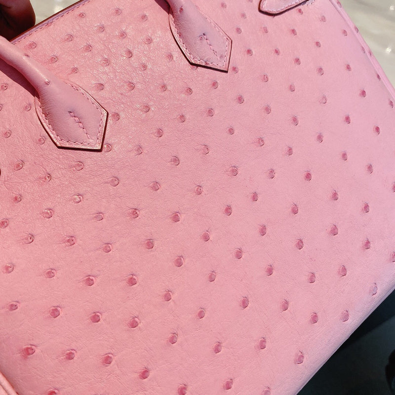 Side view of clean-lined structured handbag