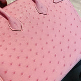 Side view of clean-lined structured handbag