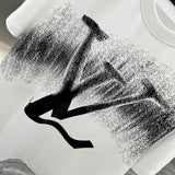Flat lay presentation of Louis Vuitton cotton t-shirt with relaxed-fit cut