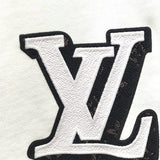 Flat lay presentation of Louis Vuitton luxury clothing with streetwear-inspired cut