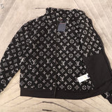 Close-up detail shot of Louis Vuitton luxury clothing with relaxed-fit cut