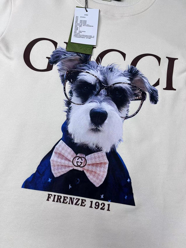 Side profile of Gucci luxury clothing with signature branding