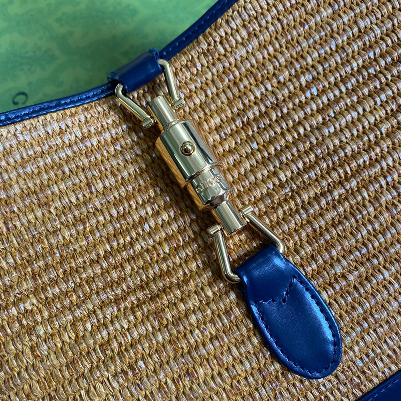 Handle and strap detail of statement elevated women's handbag – women's luxury accessory