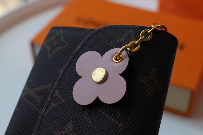 Styled lifestyle shot of structured classic women's handbag – women's luxury accessory