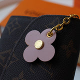 Styled lifestyle shot of structured classic women's handbag – women's luxury accessory