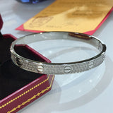 Angled view of Cartier unisex jewelry piece