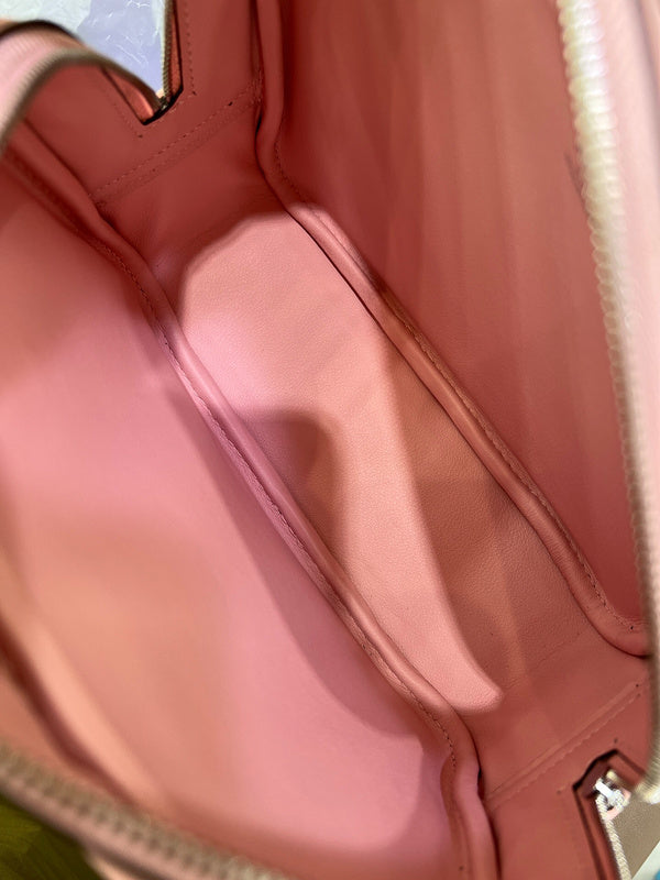 Side view of minimalist structured handbag