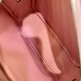 Side view of minimalist structured handbag