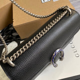 Styled lifestyle shot of sleek premium women's handbag – women's designer-style accessory