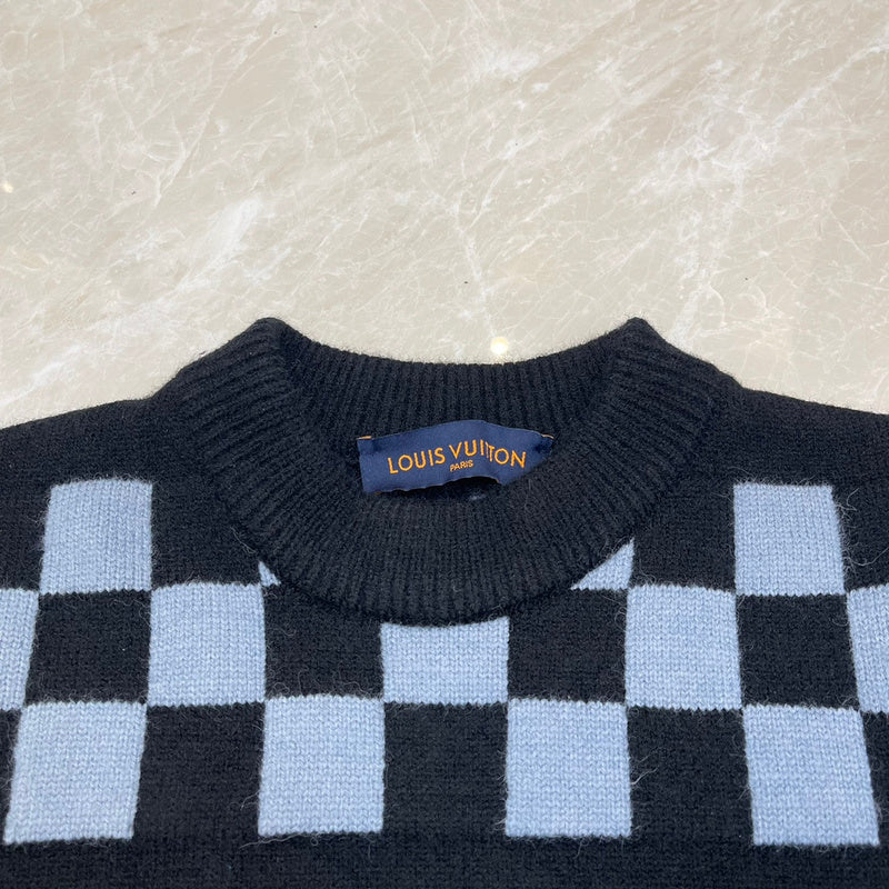 Back view of Louis Vuitton luxury clothing with streetwear-inspired cut