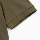 Flat lay presentation of Polo cotton polo shirt with logo-detail design