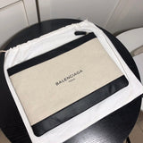 Front view of structured signature women's handbag – women's luxury accessory