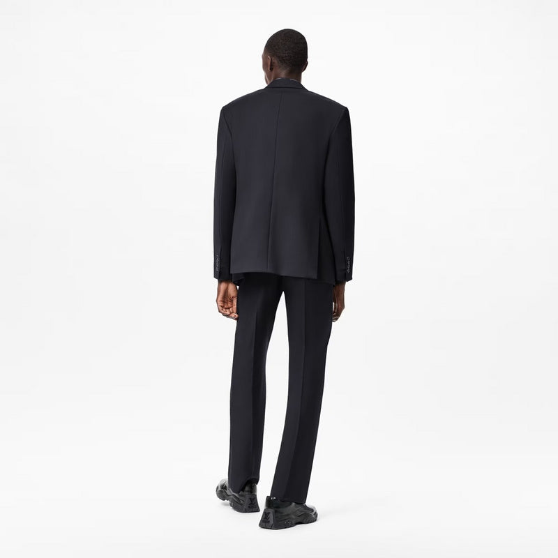 Close-up detail shot of Louis Vuitton luxury clothing with contemporary cut