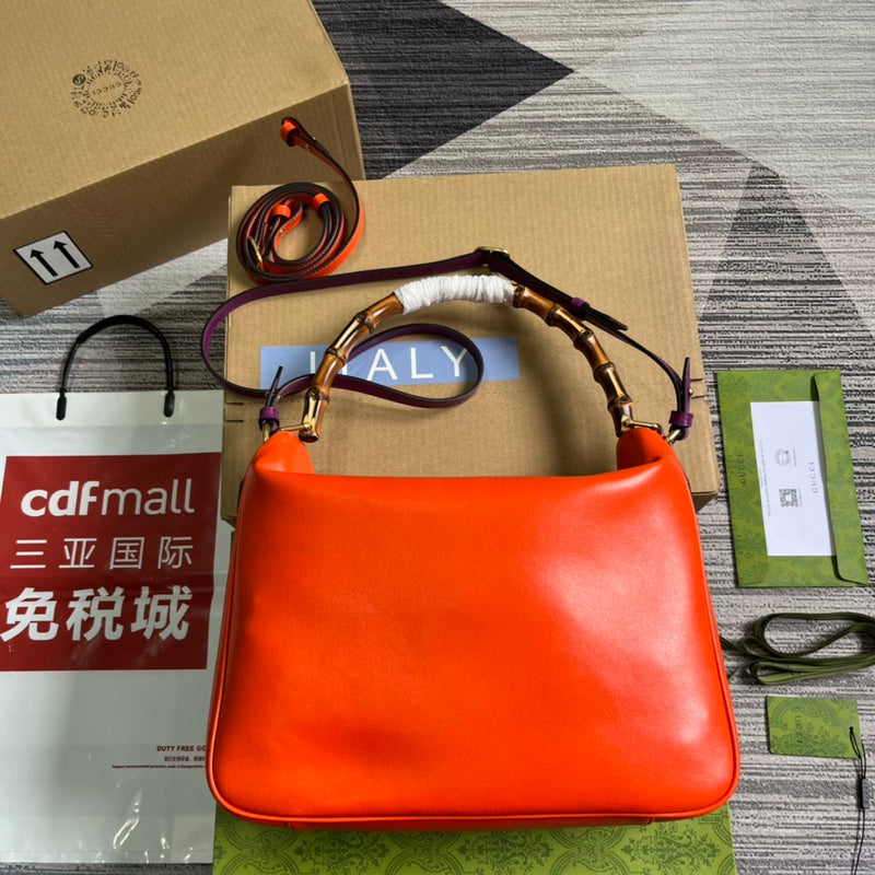 Front view of polished refined women's handbag – women's luxury accessory