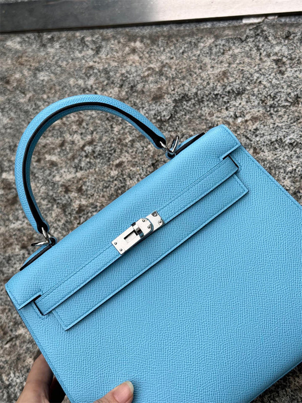Side view of graceful structured handbag
