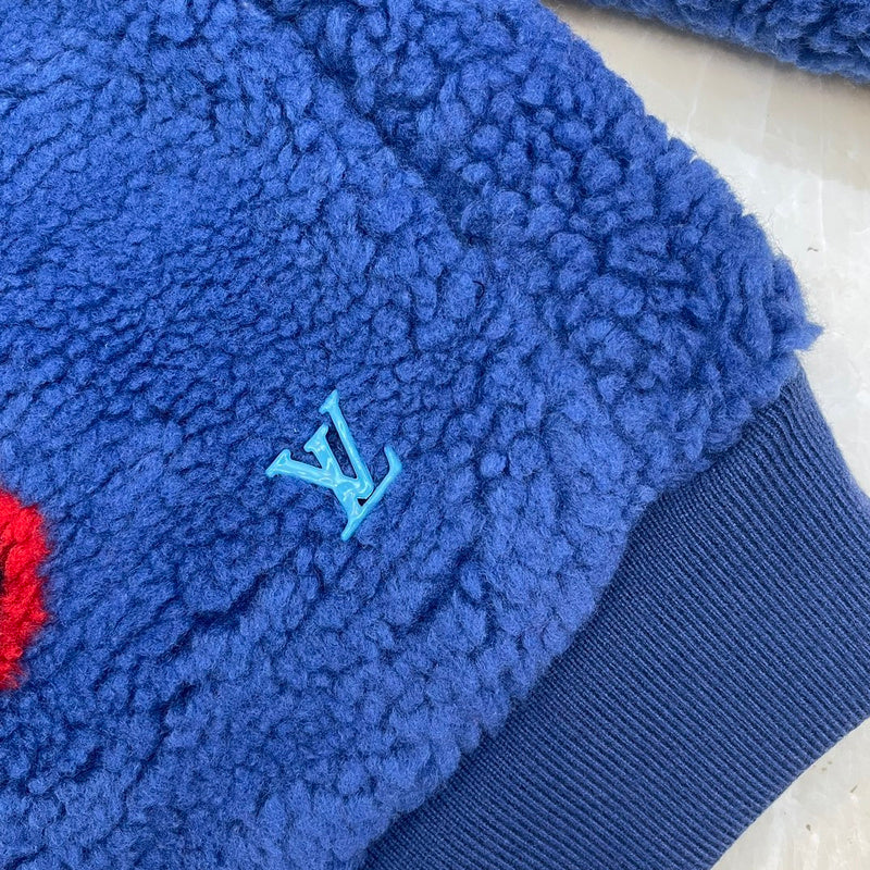 Front view of Louis Vuitton luxury clothing with everyday silhouette