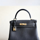 Side view of understated structured handbag