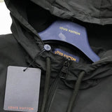 Front view of Louis Vuitton luxury clothing with signature branding