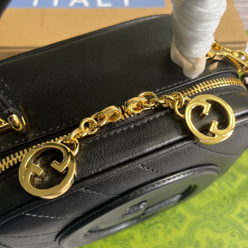 Front view of statement polished women's handbag – women's luxury accessory