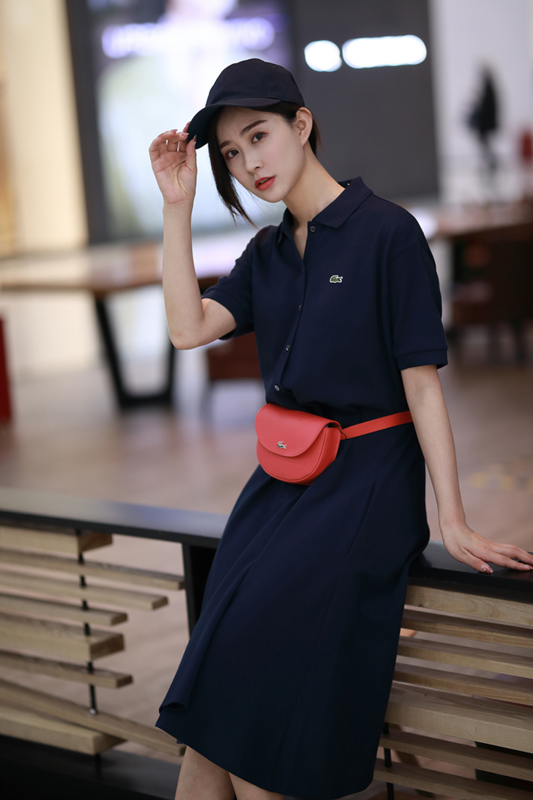 Side profile of Lacoste luxury clothing with logo-detail design