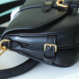  crossbody bag close-up of hardware and finish 11