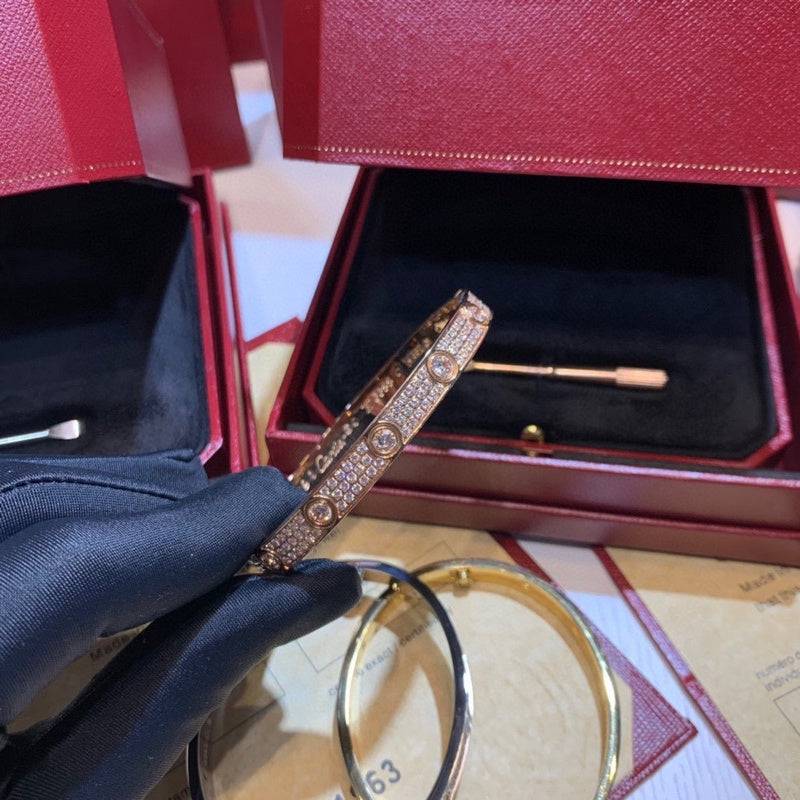 Front view of Cartier unisex jewelry piece