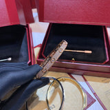 Front view of Cartier unisex jewelry piece