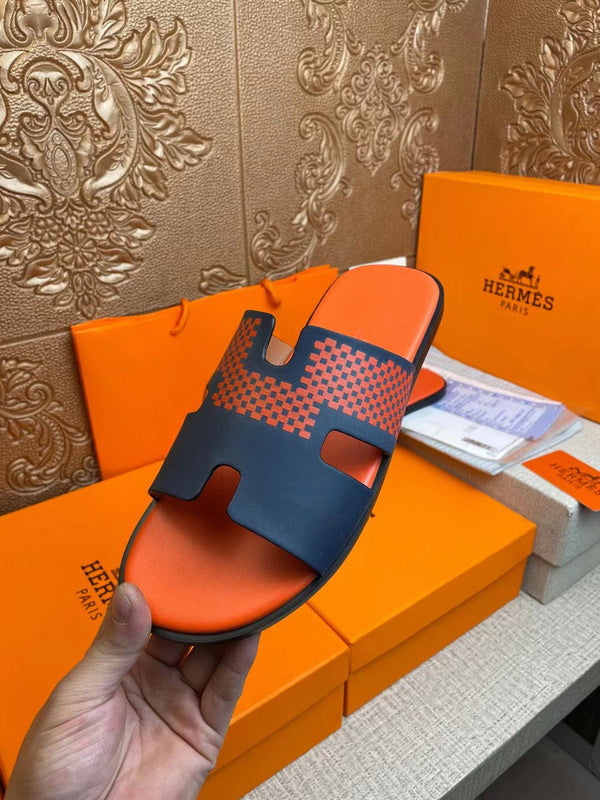 Hermes shoes Style 028 - close-up of statement logo accent