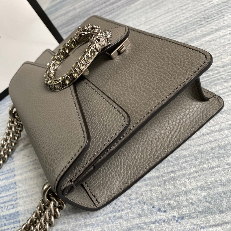 Handle and strap detail of classic structured women's handbag – women's designer-style accessory