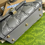 Styled lifestyle shot of statement structured women's handbag – women's designer-style accessory