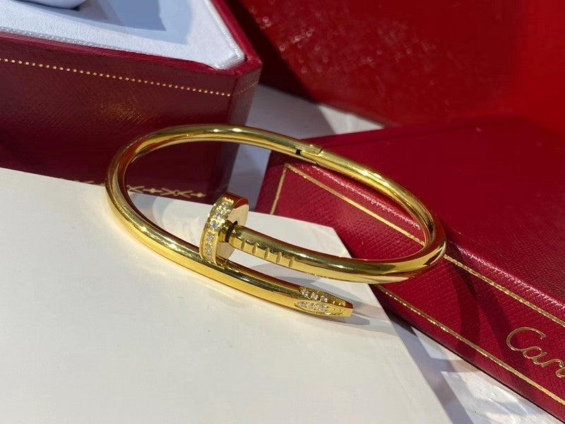 Side view of Cartier unisex jewelry piece