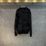 Side profile of Louis Vuitton luxury clothing with label-forward styling