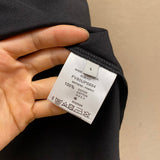 Side profile of Givenchy luxury clothing with everyday silhouette